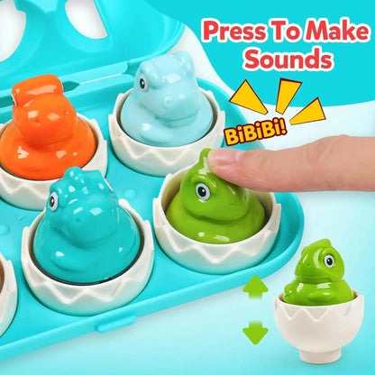 Press dinosaur egg toy to make sounds