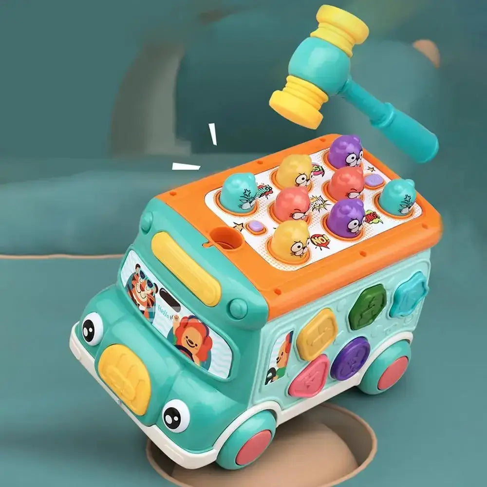 Green musical bus toy with hammer and shape sorter