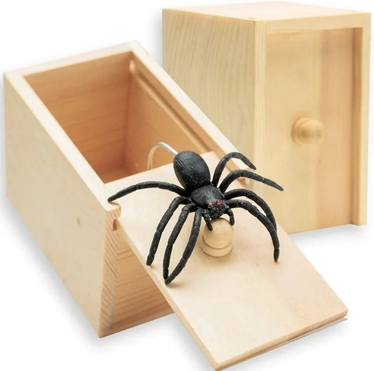 Handmade wooden prank box with a realistic black spider that jumps out when the lid is opened. Perfect for funny surprises and party tricks.