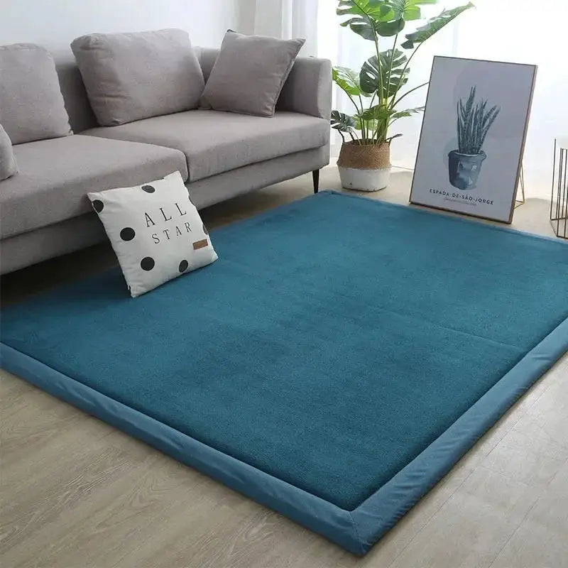 Teal soft play mat with sofa and decor